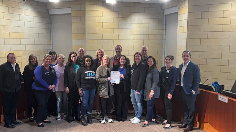 The village of Montgomery recognized Child Abuse Prevention Month by honoring those serving on the front lines of child advocacy and protection. Pictured, from left to right, Village Trustee Matt Bauman, Village Clerk Debbie Buchanan, Police Social Worker Erica Lopez, Village Trustee Theresa Sperling, SART Nurse Jeana Friday, SANE Coordinator (Northwestern Medicine) Mindie Robles, Village Trustee Dan Gier, SART Nurse Deja Brown, CASA Kendall County Executive Director Heidi Baird, SANE Coordinator (Rush Copley Medical Center) Gina Becker-Espinoza, Village Trustee Doug Marecek, Kane County Child Advocacy Center Victim Advocate Kallie Sakamoto, Kane County Child Advocacy Center Forensic Interviewer Sara Innocenti, Village Trustee Steve Jungermann, CASA Kendall County Volunteer Coordinator Elizabeth Serediuk, Montgomery Police Department Detective Gina Galanis, Montgomery Village President Matt Brolley.