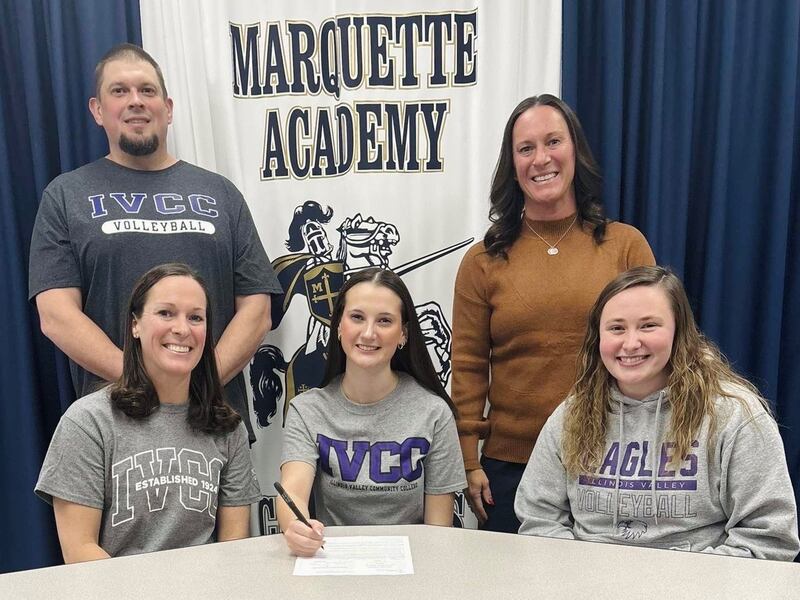 Recent Marquette Academy graduate Kealey Rick has committed to continue her academic career at Illinois Valley Community College and her volleyball career at NJCAA level with the Eagles. Seated with Rick is mother Brooke Rick and IVCC head coach Kate Vigars. Standing behind are father Justin Rick and Marquette head volleyball coach Mindy McConnaughhay.