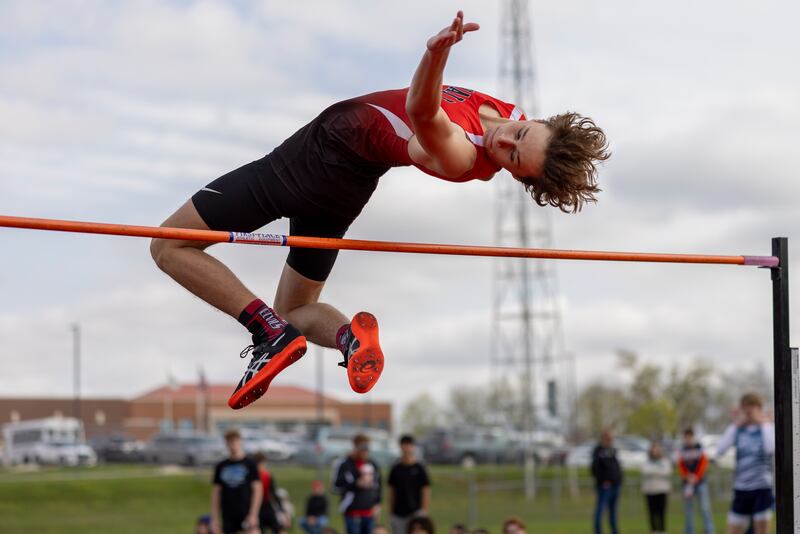 Joseph Perez of Hall High School leaps over the bar during the boys high jump event at the Rollie Morris Invite on April 19, 2025 at St. Bede Academy.