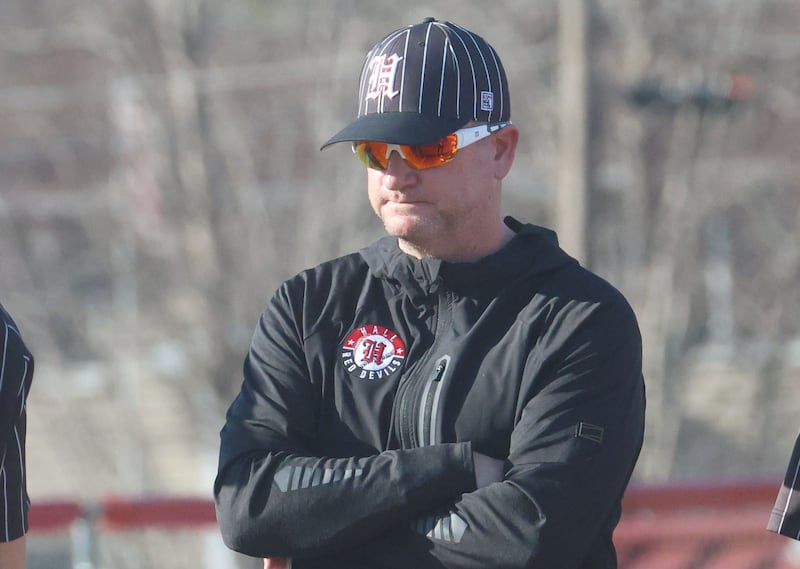 Hall head baseball coach Tom Keegan makes a pitching change while playing Streator on Thursday, March 19, 2026 at Streator High School.