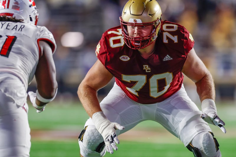 Boston College offensive lineman Ozzy Trapilo (70) anchors the line during the first half of an NCAA football game against Louisville on Friday, Oct. 25, 2024, in Chestnut Hill, Mass. (AP Photo/Greg M. Cooper)
