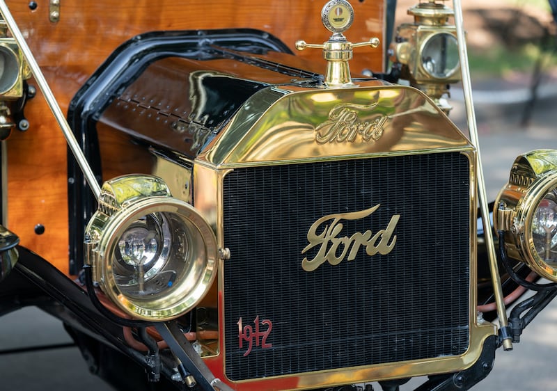 A 1912 Ford Touring owned by Marty and Sue Brackin on display during the 2024 Geneva Concours d'Elegance on Sunday, August 25, 2024 in downtown Geneva. Car enthusiasts gathered along Third Street to display classic, antique and modern automobiles.