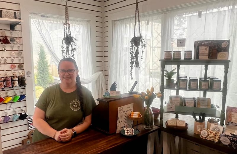 Erica Bentz stands ready to help customers at her store, Leigh Alan Designs, in the Shoppes At Grandon Plaza small business incubator at 310 Second Ave. in Sterling, Illinois.