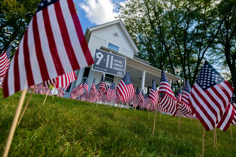 2,977 flags are planted on the campus of the Reagan Boyhood Home Thursday, Sept. 11, 2025, in recognition of the Young America’s Foundation Never Forget Project. Since 2003, the project has set up over 14 million flags across the nation as a tribute to the lives lost on 9/11.