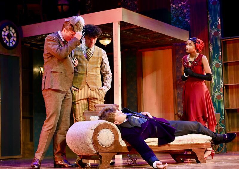 Upon his arrival at Haversham Manor, Inspector Carter, played by Mason Hamilton, is greeted by Thomas and Florence Colleymoore, played by Theo Fritz and Charlotte Banks. The inspector has been called to investigate the death of Charles Haversham, played by Julian Micetich. The story is told in Coal City Theatre Department’s fall play production of “The Play That Goes Wrong.”