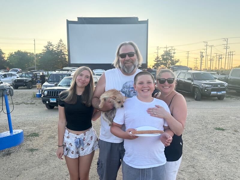 Regnas family members (from left) Lily, Gabe, Jackson and Kristi enjoyed a recent evening at the McHenry Outdoor Theater with their pooch, Ryder. While well-behaved, leashed dogs are always welcome, a special Bring Your Dog to the Movies event is set for Aug. 22-23.