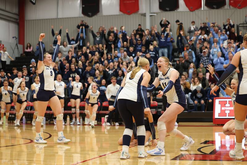 Cissna Park's Sophie Duis (11) turns to celebrate with teammates as the Timberwolves secured a victory in two sets, 25-22, 25-11, over Windsor/Stewardson-Strasburg in the IHSA Class 1A Heyworth Super-Sectional on Monday, Nov. 10, 2025.