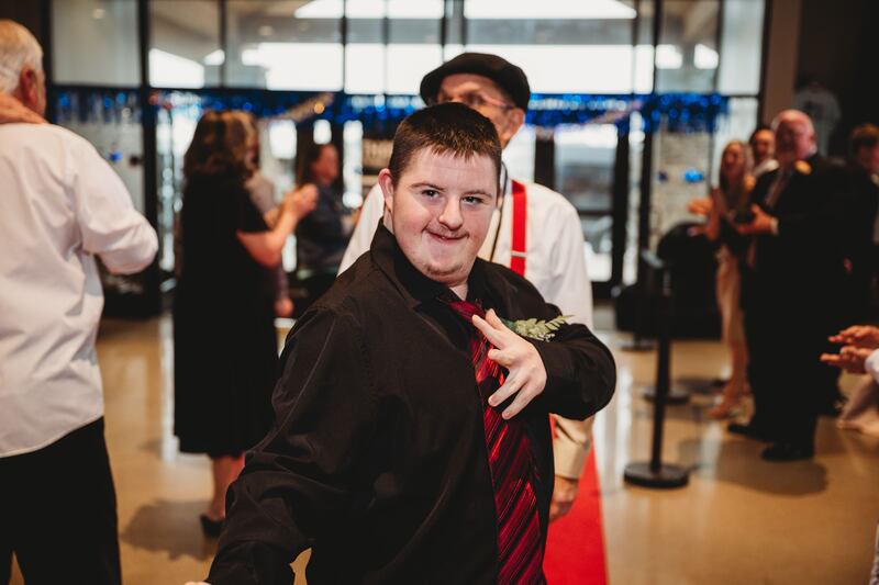A Dance the Night Away attendee dances during the event on Friday, April 4, 2025.