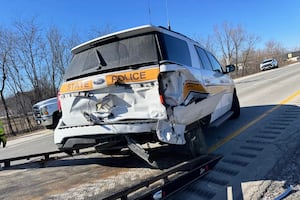 State trooper injured after vehicle struck on I-57
