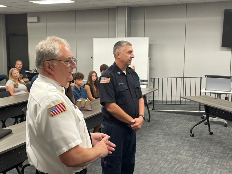 Mendota Fire Chief Dennis Rutishauser (left) introduces Nate Tolley as a full-time firefighter-paramedic to the Mendota City Council on Monday, Oct. 6, 2025. Tolley is not a newcomer to the city, having been a paid, on-call firefighter for 19 years.