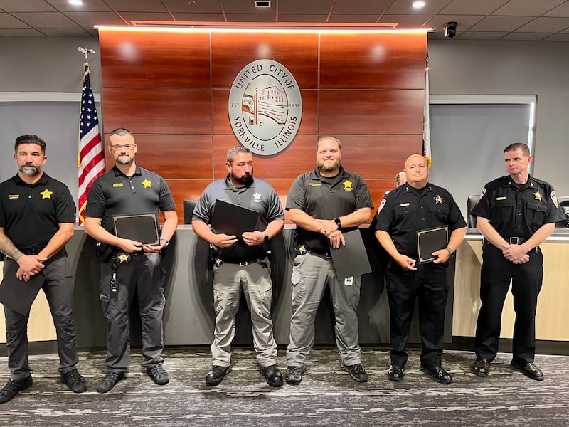 Distinguished Service Awards were presented to the members of the investigations unit by Yorkville Police Chief James Jensen. Those awarded include Detective Jeff Johnson, Detective Matt Ketchmark, School Resource Officer Ryan Goldsmith, Detective Sergeant Matt Nelson and Deputy Chief Ray Mikolasek.