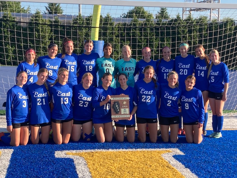 The Lincoln-Way East girls soccer team after winning the Joliet Central Regional Championship.