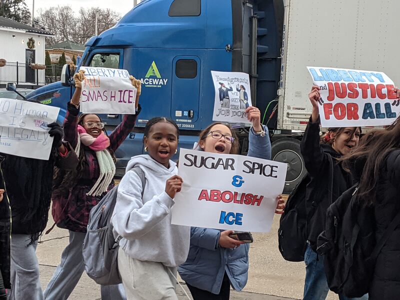 Oswego High School students walk through downtown Oswego as part of a student walkout against the actions of Immigration and Customs Enforcement agents on Friday, Feb. 6, 2026.