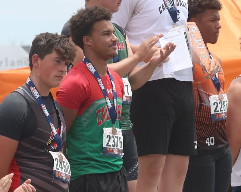 La Salle-Peru's Aavery Hill stands on the podium after getting fourth place in the Class 2A discus during the IHSA State Track and Field championship on Saturday, May 30, 2026 in Charleston.