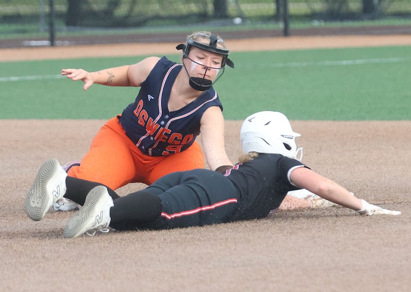 Oswego's Kennedy Gengler tags out Mundelein's Devin Hill stealing second base during the Class 4A State semifinal game on Friday, June 5, 2026 at the Louisville Slugger Complex in Peoria.