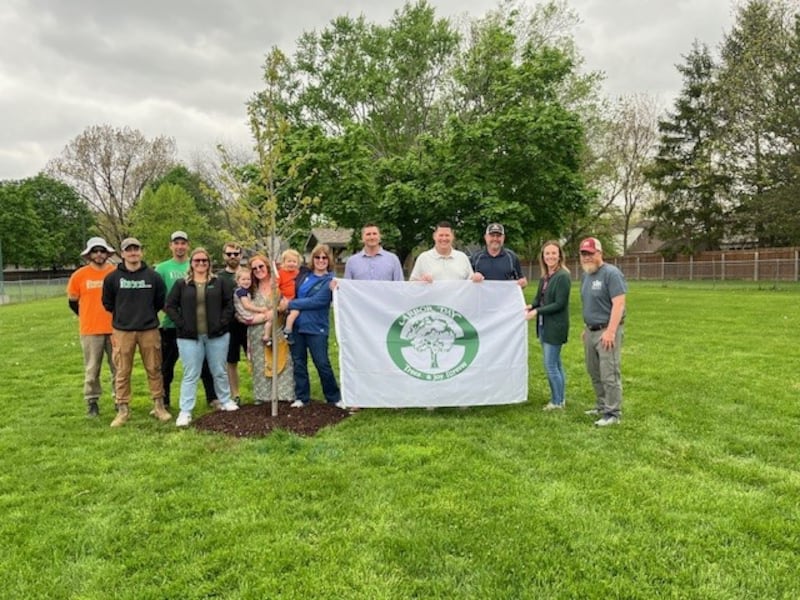 The City of Morris, Spring Grove Nursery and ITrees with one of the new trees planted in a Morris city park.