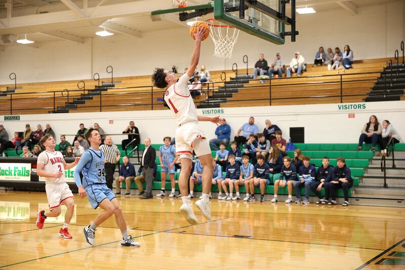 Senior guard Benny Olalde drives in for a lay-up against Bureau Valley in a neutral-site game at Rock Falls.