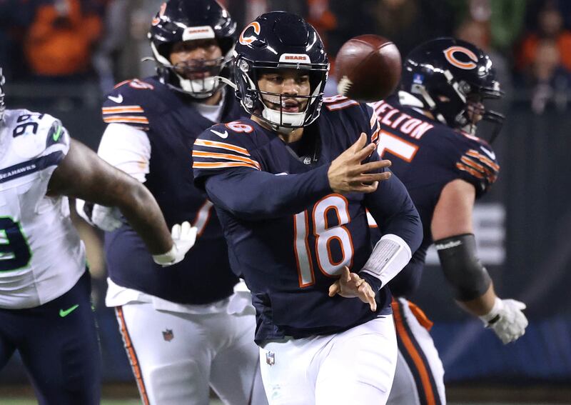 Chicago Bears quarterback Caleb Williams throws a pass after escaping the Seattle Seahawks pressure during their game Sunday, Dec. 26, 2024, at Soldier Field in Chicago.
