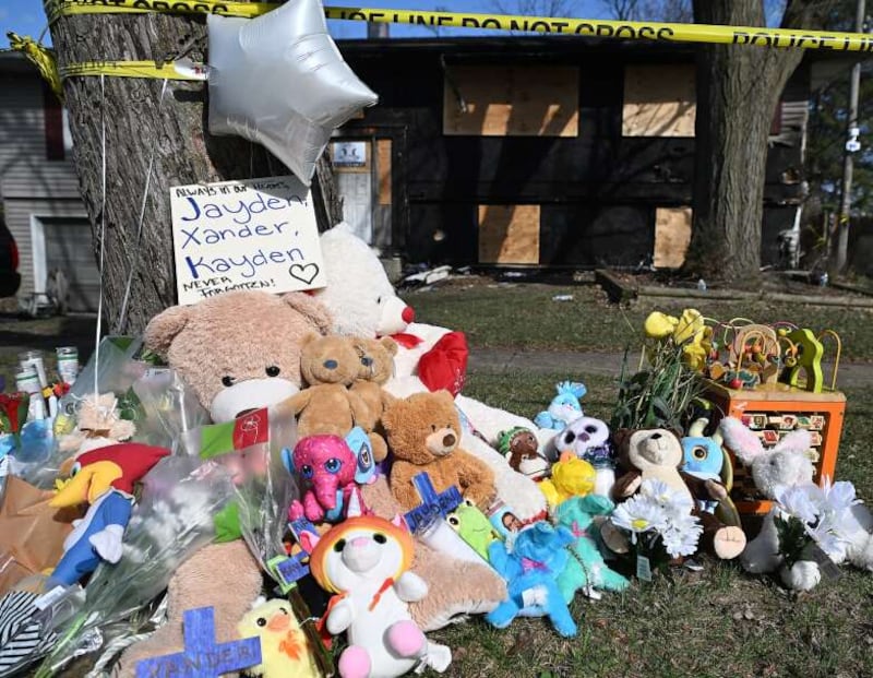 Mementos and tributes are left outside a Carpentersville home on Monday, March 31, 2025, where three children died in a fire the previous day.
