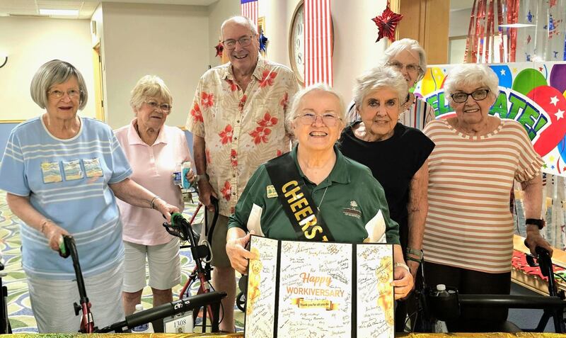 The Timbers of Shorewood recently celebrated 20-year work anniversary of its transportation coordinator Diane Pfoser.