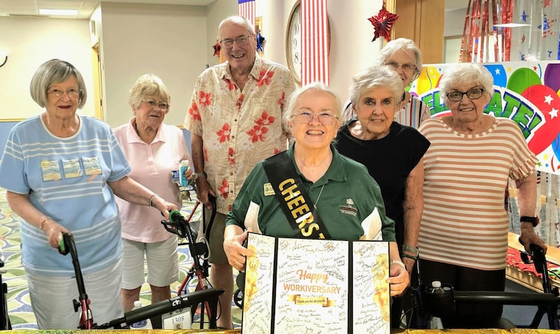 The Timbers of Shorewood recently celebrated 20-year work anniversary of its transportation coordinator Diane Pfoser.