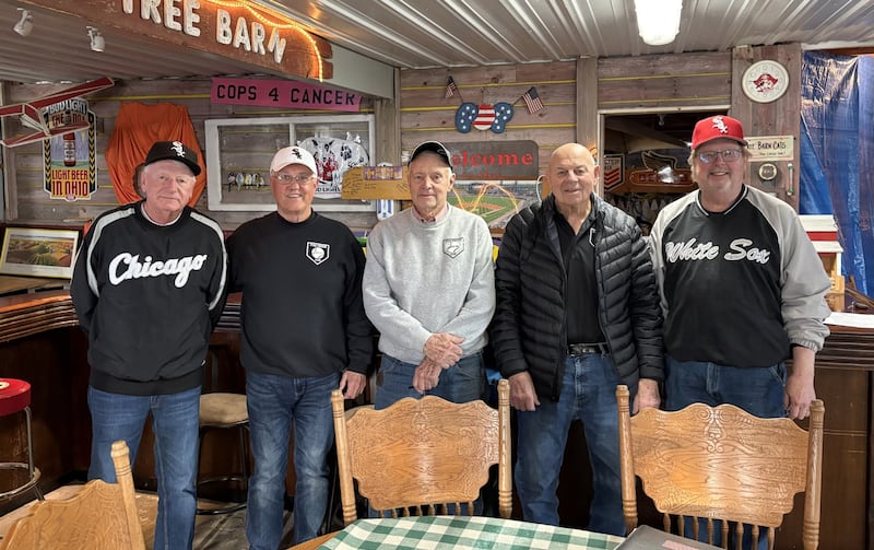 From left: Lew Cushing, Randy Tufity, Ron Chalus, Robert “Bo” Windy and Dave Fowler pose for a photo at Chalus’ barn before a Fireside White Sox Club meeting on Tuesday, March 24.