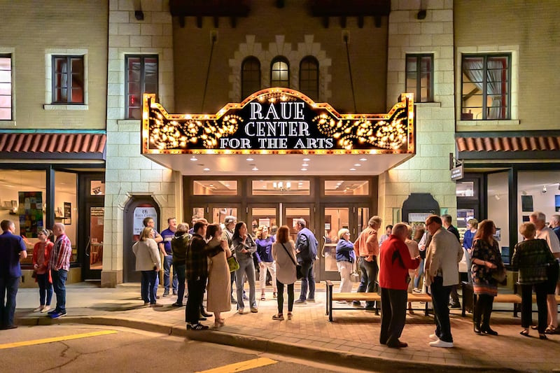 An audience gathers outside the Raue Center For The Arts in Crystal Lake.