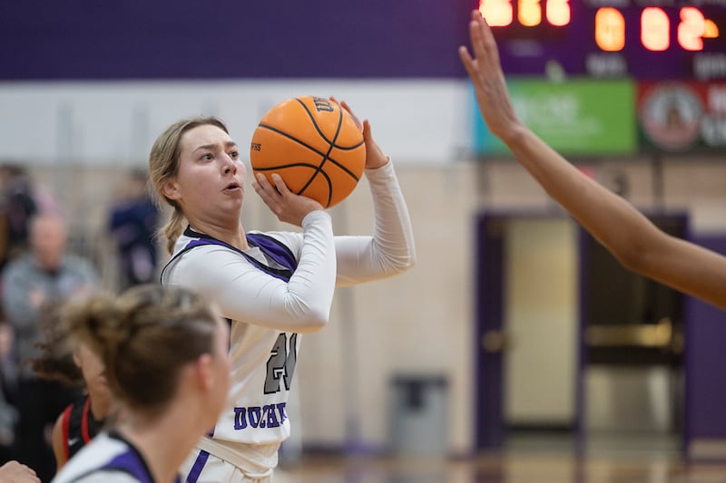 Dixon’s Reese Dambman puts up a three-point shot against Rockford East Monday, Feb. 16, 2026.