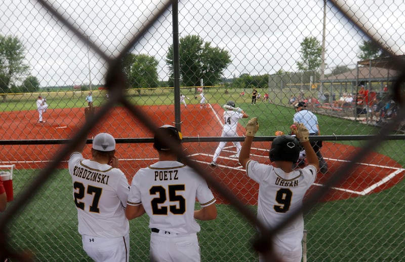 Members of the Canes baseball team watch as there teammate bats during a game against the RBA Lampl in the opening round of the Under 13 McHenry County Youth Sports Association’s Summer International Championship baseball tournament on Friday, July 11, 2025, at the Mickey Sund Baseball Complex in Crystal Lake's Lippold Park.