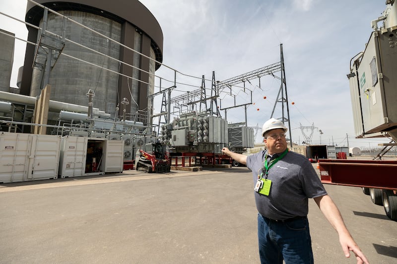 Paul Dempsey shows off a new transformer that will be installed Wednesday, April 16, 2025, at the Byron Nuclear Power Station.