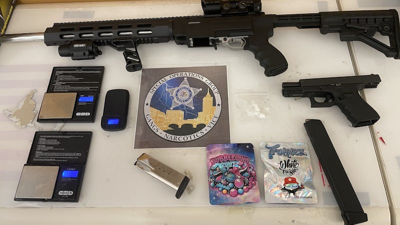 Aurora police say they found stolen, loaded handgun and drugs during traffic stop; local man charged