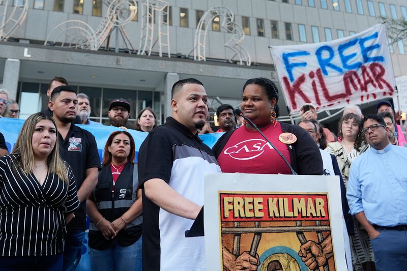 Jennifer Vasquez Sura, front left, wife of Kilmar Abrego Garcia, attends a protest rally at the Immigration and Customs Enforcement field office in Baltimore, Monday, Aug. 25, 2025, to support Kilmar Abrego Garciab. (AP Photo/Stephanie Scarbrough)