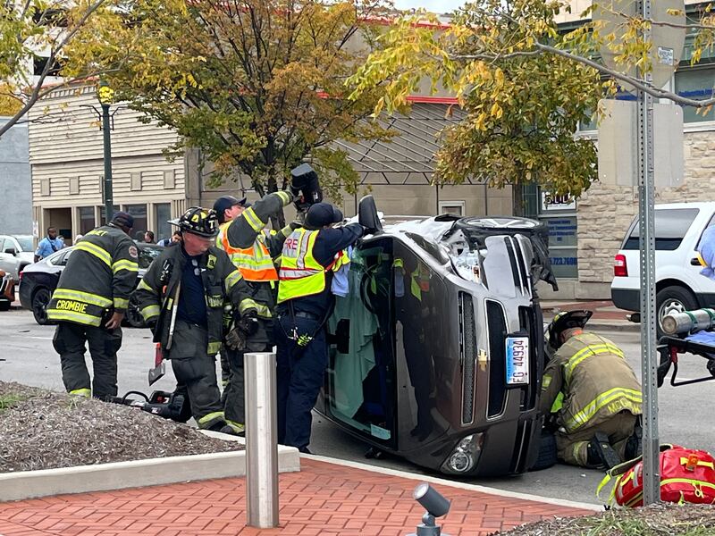 A man was extracted from a vehicle after it rolled over and crashed outside the Will County courthouse on Tuesday, Oct. 28, 2025.