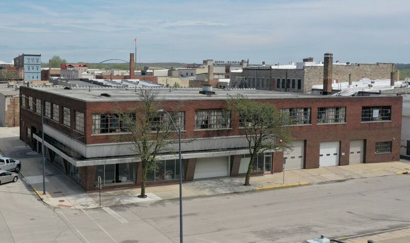 An aerial view of the former La Salle Public Works building on 2nd Street and Wright Street on Thursday, April 18, 2024 in La Salle. The 18,000 square foot building and parking lot has been listed for sale. The brick two-story building was the site where the city housed their vehicles and other storage items. The building was appraised at $256,500.