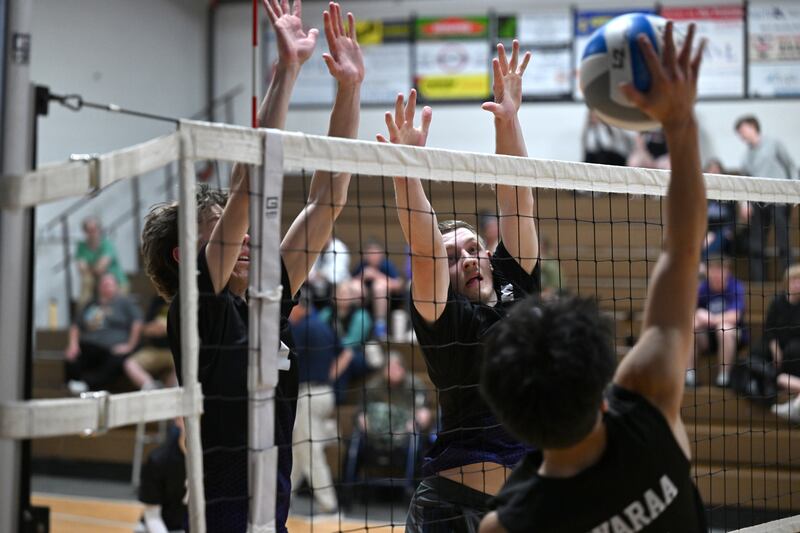 Manteno's Ben Milton and Eric Eldridge block Kankakee Trinity Academy's Johnny Bayaraa's attempt to score on Thursday, May 1, 2025.