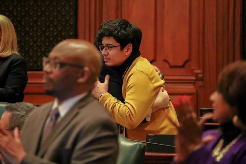 Manny Alvarez, son of Karina Gonzalez, hugs Rep. Edgar Gonzalez Jr., D-Chicago, in the Illinois House on Tuesday, January 7, 2025.