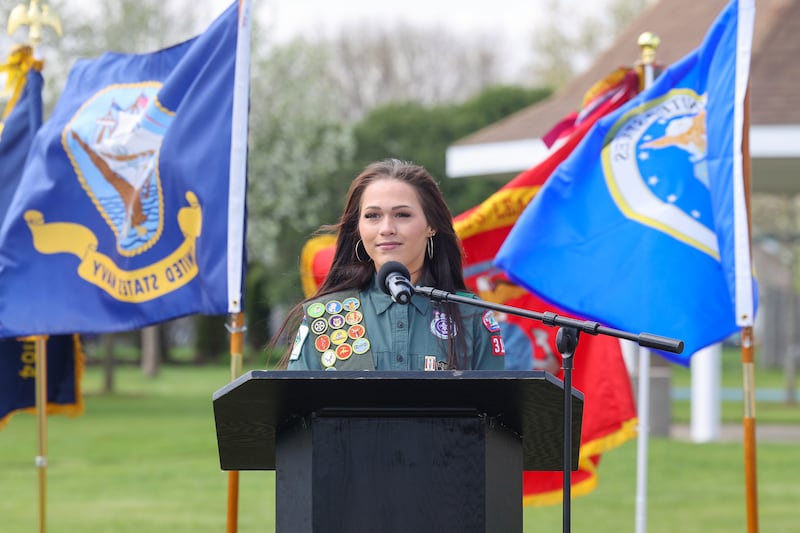 Alexis McCullough speaks to the crowd of over 150 people attending the Gold Star Families Memorial Monument dedication ceremony at Marcotte Park in Bourbonnais on Saturday, April 26, 2025. The project was planned and fundraised for by 17-year-old McCullough, of Bourbonnais, for her Eagle Scout project in honor of her father, Col. Mark McCullough.