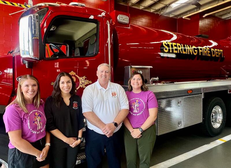 Left to right: Regional Office of Education (ROE) #47 Attendant Support Specialist Kayla Brown, Sterling Fire Department's Administrative Assistant Angelica Dornes, SFD's Fire Chief David Northcutt and ROE #47's Attendant Support Specialist Tabatha Behrens. The ROE#47 and the Sterling Fire Department are teaming up for a school supply drive in Sterling, Illinois, on June 21.