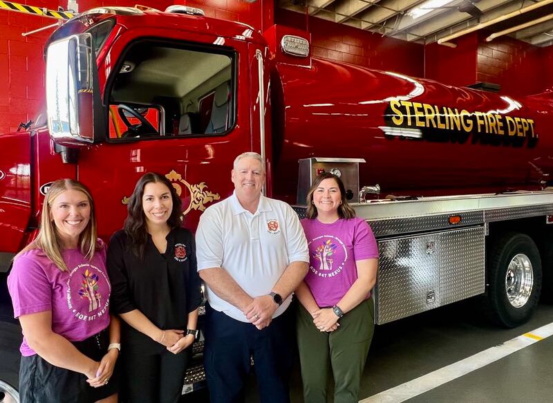 Left to right: Regional Office of Education (ROE) #47 Attendant Support Specialist Kayla Brown, Sterling Fire Department's Administrative Assistant Angelica Dornes, SFD's Fire Chief David Northcutt and ROE #47's Attendant Support Specialist Tabatha Behrens. The ROE#47 and the Sterling Fire Department are teaming up for a school supply drive in Sterling, Illinois, on June 21.