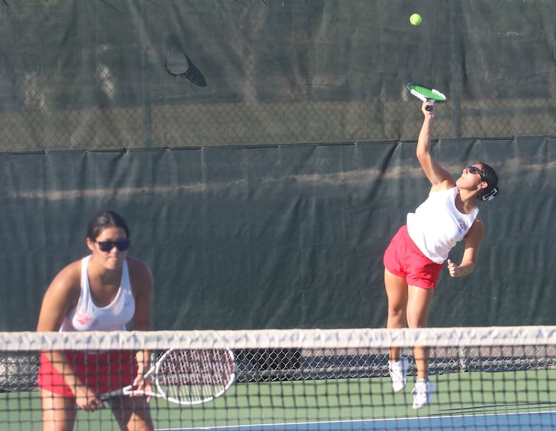 Ottawa number one tennis team members Zulee Moreland and Yaquelin Hernandez-Solis play tennis on Tuesday, Sept. 16, 2025 at Ottawa High School.