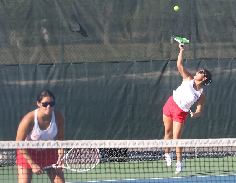 Ottawa number one tennis team members Zulee Moreland and Yaquelin Hernandez-Solis play tennis on Tuesday, Sept. 16, 2025 at Ottawa High School.