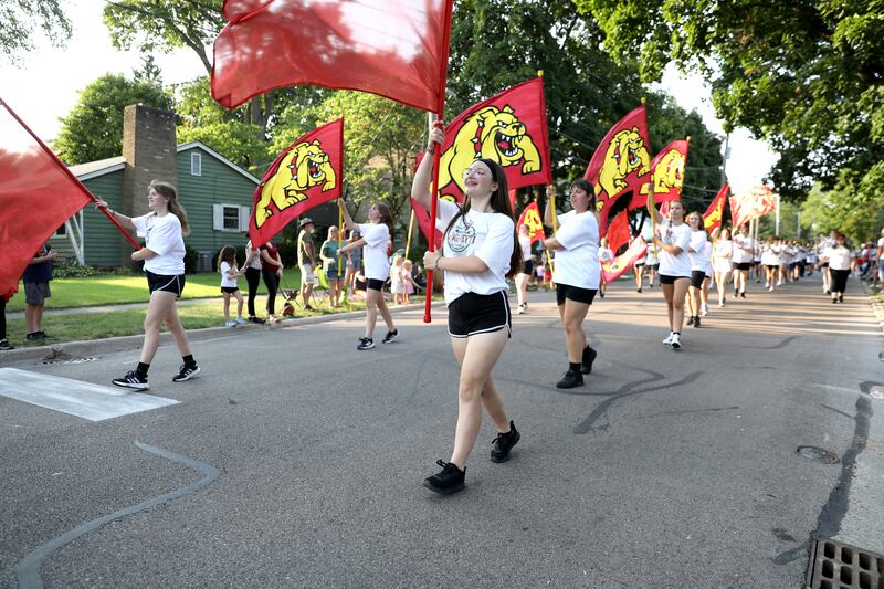 Members of the Batavia High School color guard march in the school’s annual homecoming parade on Wednesday, Sept. 11, 2024 in Batavia.