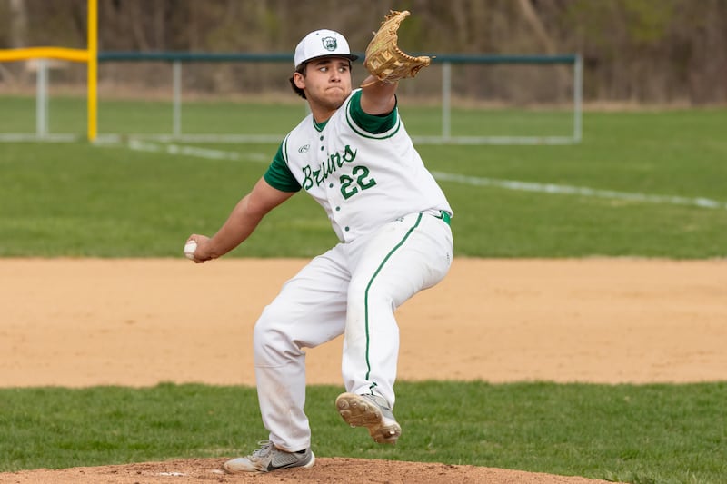 Alan Spencer (22) of St. Bede pitches on Thursday, April 10, 2025 at St. Bede High School in Peru.