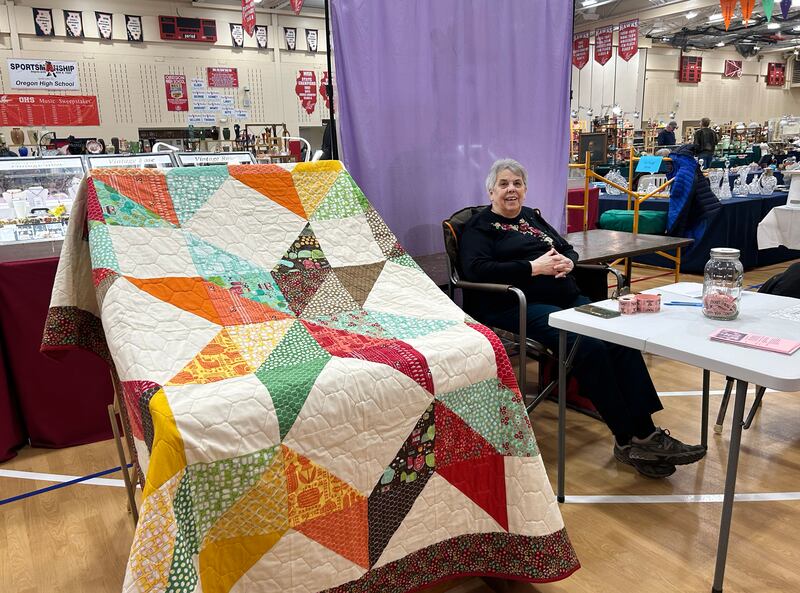 Sharon Nordman of Leaf River's Merry Martha Quilt Club sold raffle tickets for the 2025 quilt during the Oregon Woman's Club Antique Show & Vintage Market held at the Blackhawk Center in Oregon on Sunday, March 23, 2025.