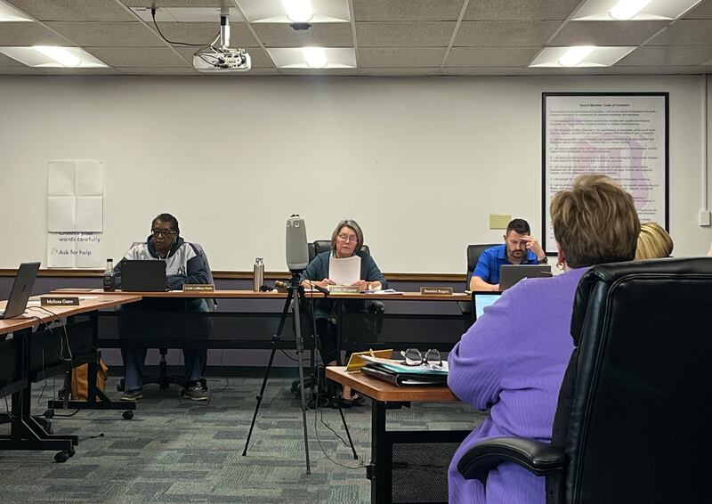 Dixon School Board President Linda Wegner (middle) reads the approved Vision 2030 resolution Wednesday, April 16, 2025. The resolution is an educational framework intended to push for needed changes in public kindergarten to 12th grade education across Illinois.