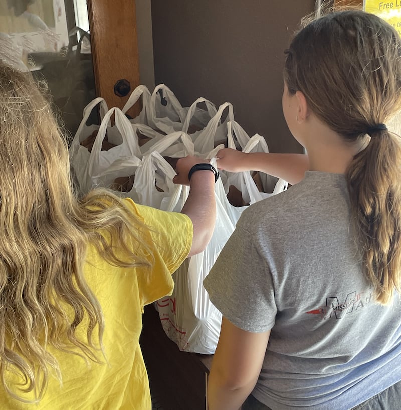 United Way of Whiteside County volunteers providing “Let’s Feed Our Children” program meals