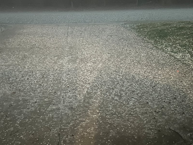 Hail covers a drive way on Tuesday, March 10, 2026 in Princeton.