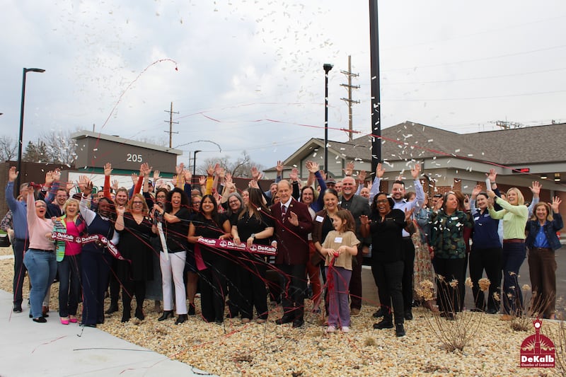 The DeKalb Chamber of Commerce celebrating Heartland Bank and Trust Company’s new branch's grand opening