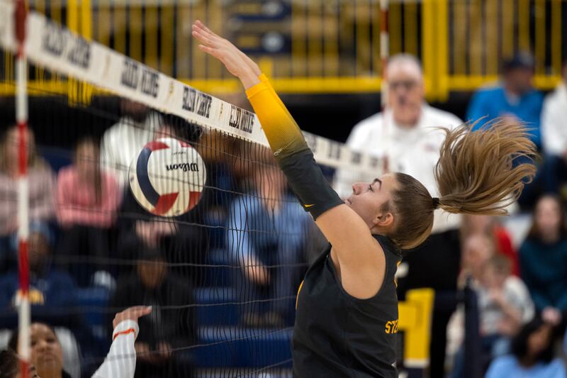Sterling’s Megan Stutzke makes a block against Freeport Tuesday, Oct. 28, 2025, in the Class 3A regional semifinal at Sterling.