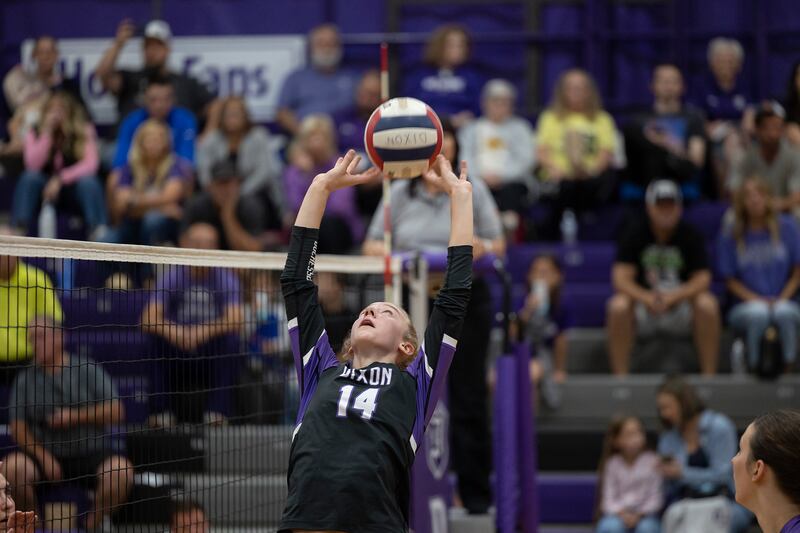 Dixon’s Leah Carlson sets the ball against LaSalle-Peru Wednesday, Sept. 10, 2025.